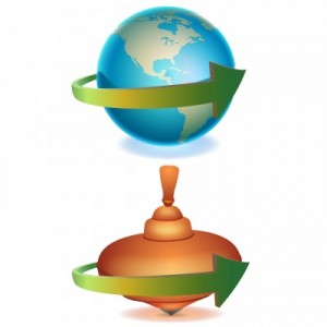 A picture of the Earth and a toy top comparing how the Earth spins like a toy top.