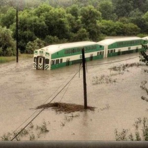 A picture of a train in Toronto stopped by flood waters.